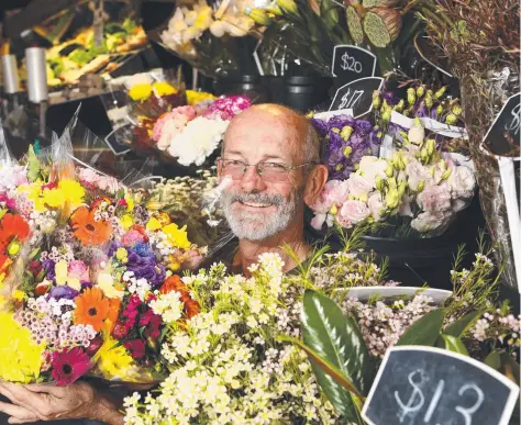 ?? Picture: GLENN HAMPSON ?? Florist Gary O’Reilly has worked in the Currumbin electorate for more than 40 years and “hopes he is still alive to see the light rail come down here”.