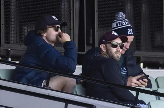  ?? Picture: MICHAEL KLEIN ?? ONLOOKERS: Glenn Maxwell and Will Pucovski watch Victoria tackle NSW at the MCG. Pucovski is expected back at Victoria training this week.