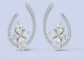  ??  ?? The Emblem EXT diamond
earrings