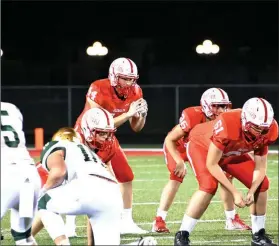  ?? PILOT PHOTO/MAGGIE NIXON ?? Matthew Mccrum waits for the snap late in the game as Plymouth took a big win over Wawasee.