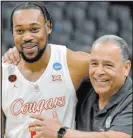  ?? Brandon Dill The Associated Press ?? Forward J’wan Roberts and coach Kelvin Sampson have Houston in the Sweet 16.