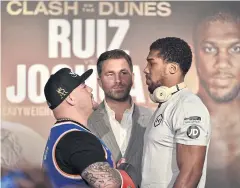  ?? AFP ?? Andy Ruiz Jr, left, and Anthony Joshua face off during a press conference in Diriyah, Saudi Arabia, on Wednesday.