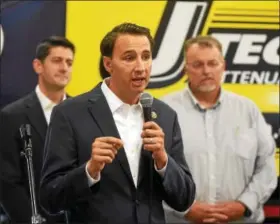  ?? PETE BANNAN — DIGITAL FIRST MEDIA ?? U.S. Rep. Ryan Costello, R-6, speaks at J-Tech Inc. Thursday. With him is House Speaker Paul Ryan and business owner Scott Johnson.