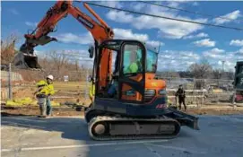  ?? STEPH MACHADO/GLOBE STAFF ?? Gano Street was briefly closed last month to make repairs attributed to the detour from the Washington Bridge.