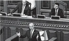  ?? SERGEI CHUZAVKOV/AP ?? Then-Vice President Joe Biden addresses the Ukraine Parliament in Kyiv in 2015.