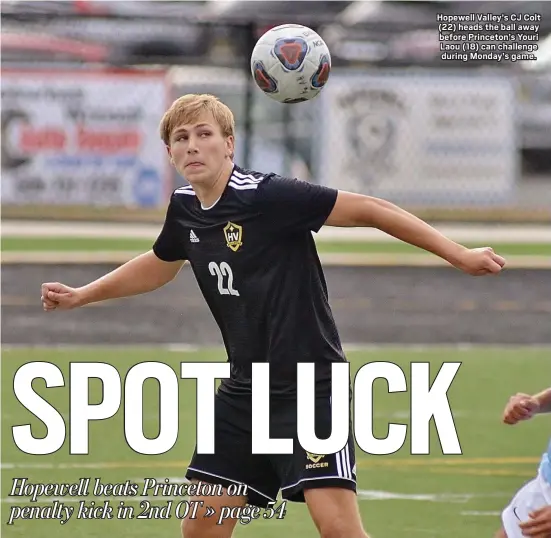  ?? KYLE FRANKO — TRENTONIAN PHOTO ?? Hopewell Valley’s CJ Colt (22) heads the ball away before Princeton’s Youri Laou (18) can challenge during Monday’s game.