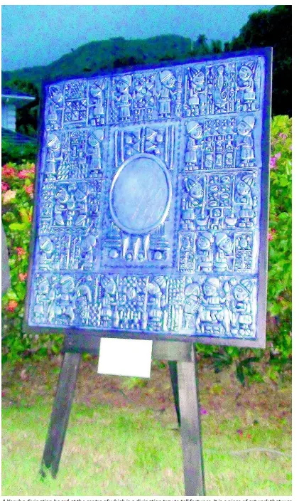 ?? PHOTO BY PAUL H. WILLIAMS ?? A Yoruba divination board at the centre of which is a divination tray to tell fortunes. It is a piece of artwork that was done by Nigerian cultural diplomat to Jamaica Alao Luqman.