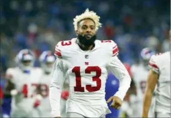  ?? RICK OSENTOSKI — THE ASSOCIATED PRESS ?? Giants wide receiver Odell Beckham runs onto the field before the second half of a preseason game against the Detroit Lions on Friday.