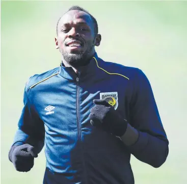  ?? Picture: AAP/SUE GRAHAM ?? RUN-UP: Usain Bolt in his first Central Coast Mariners training session.