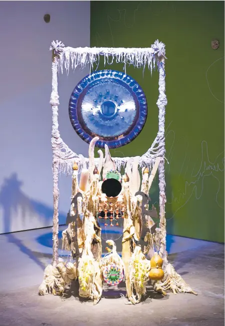  ??  ?? Guadalupe Maravilla, Disease Thrower #10 (2011-2020), mixed media, metal gong, dimensions variable; courtesy of the artist, photo Brandon Soder