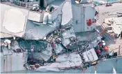  ??  ?? The damaged US Navy destroyer USS Fitzgerald