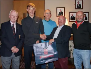  ??  ?? The Fitzgerald’s Menswear prize-giving in Wexford (from left): John Lynn (Captain), Kieran Morris (winner), Davy Byrne, Aidan Miskella of Fitzgerald’s, and Leo Connolly.