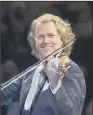  ??  ?? IN HARMONY: Andre Rieu leads a multi-national orchestra.