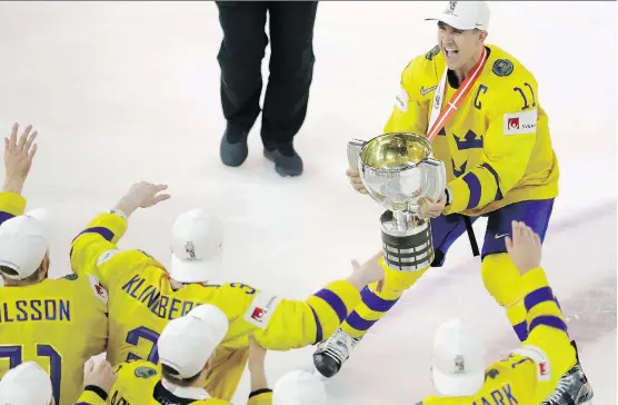  ?? PETR DAVID JOSEK/THE ASSOCIATED PRESS ?? Flames centre Mikael Backlund led Sweden to victory at the IIHF World Championsh­ip in Copenhagen, Denmark, earlier this week.