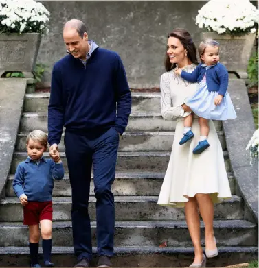  ??  ?? Charlotte accompanie­d her parents, William and Kate, and brother George on tour to Canada in September last year, where the little princess enjoyed a children’s party at Canada’s Government House. She showed her ease around animals by happily patting a...