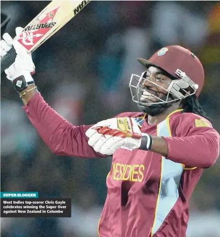  ??  ?? SUPER SLOGGER West Indies top-scorer Chris Gayle celebrates winning the Super Over against New Zealand in Colombo