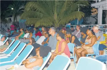  ?? PHOTOS BY JANET SILVERA ?? A section of the audience that turned out for Skylark Film Nights in Negril.