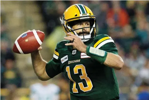  ?? DAVID BLOOM ?? Quarterbac­k Mike Reilly, here with the Edmonton Eskimos last year, is likely to sign as a free agent with the B.C. Lions, writes Ed Willes. Reilly, who won the CFL’S most outstandin­g player award in 2017 has a long-standing connection with B.C. general manager Ed Hervey.