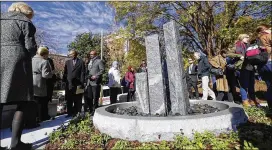  ?? UNIVERSITY OF GEORGIA ?? The University of Georgia dedicated this memorial Friday outside Baldwin Hall honoring the legacy of slaves buried on campus in the 19th century.