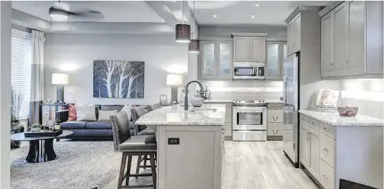  ?? PHOTOS: MATTAMY HOMES ?? The Kingsley kitchen features a gracefully curved eating bar.