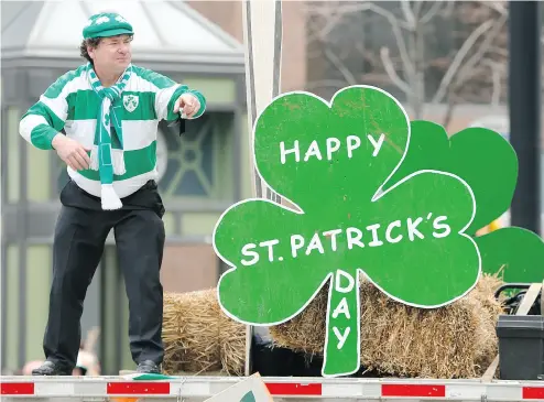  ?? JACK BOLAND / POSTMEDIA NEWS FILES ?? Thousands of Canadians celebrate St. Patrick’s Day every year by going to or participat­ing in parades.