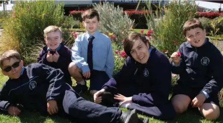  ?? Photo: Megan Stenner ?? BLOOMING BEAUT: Our Lady of Lourdes students (from left) Darius Lait, Tyler Shakespear­e, Levi Roberts, Tim Furminger and Ben Vidler are helping the school prepare for the The Chronicle Garden Competitio­n 2021.