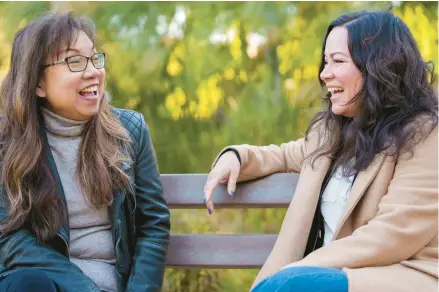 ?? DAMIAN DOVARGANES/AP ?? Anna Wong, niece of the late Anna May Wong, left, laughs with Shannon Lee, daughter of the late Bruce Lee, on March 7 in California.
