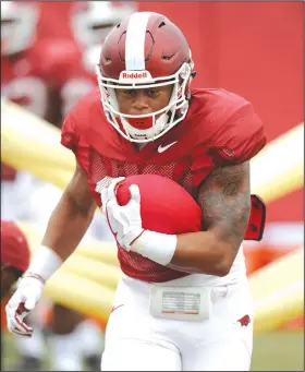  ?? NWA Democrat-Gazette/ANDY SHUPE ?? Arkansas running back Devwah Whaley and other running backs need to improve the running game in today’s scrimmage. Whaley and David Williams, working with the starting offense last Saturday, gained only 130 yards on 31 carries in unofficial statistics.