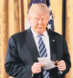  ??  ?? Trump attends a swearing in ceremony for senior staff at the White House in Washington, DC. — Reuters photo