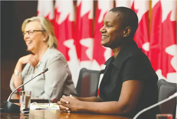  ?? Sean Kilpat rick / the cana dian press ?? New Green Party Leader Annamie Paul, right, offers her insight alongside Green government house leader Elizabeth May on Monday..