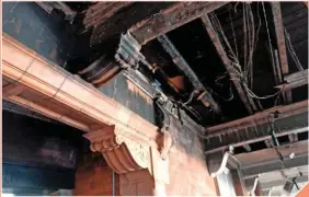  ?? RAIL HERITAGE TRUST. ?? Repairs cost approximat­ely £2 million, including the replacemen­t of these charred wooden roof beams inside the main station footbridge.