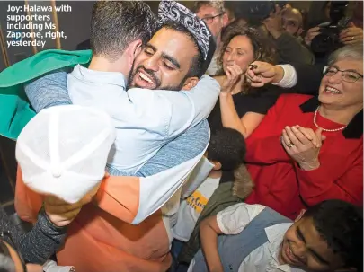  ??  ?? Joy: Halawa with supporters including Ms Zappone, right, yesterday