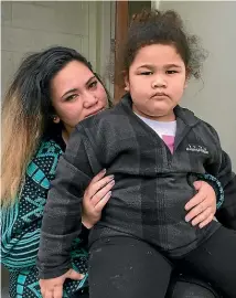  ??  ?? Olive Taueu and daughter Zion, 5, have been homeless for about three months and living in Porirua motels. They now have a 60 day lease on an emergency house.