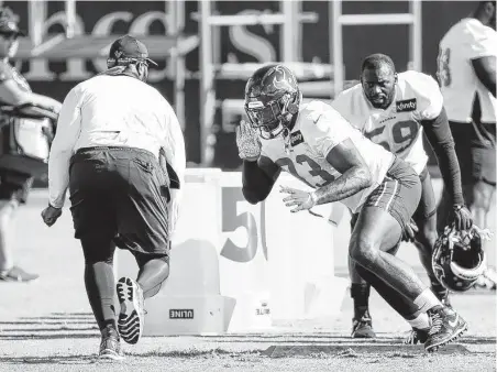  ?? Brett Coomer / Staff photograph­er ?? Even if he doesn’t start, defensive end Shaq Lawson has the experience and skills to make an instant impact for the Texans.