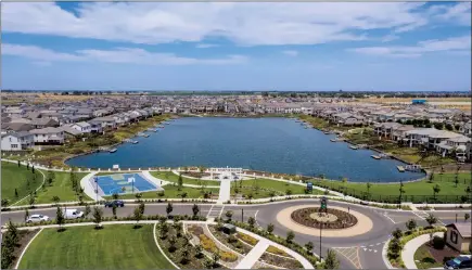  ??  ?? More than ever, the appeal of living close to nature, open space, parks and lakes makes River Islands in Lathrop an appealing choice for Bay Area homebuyers.