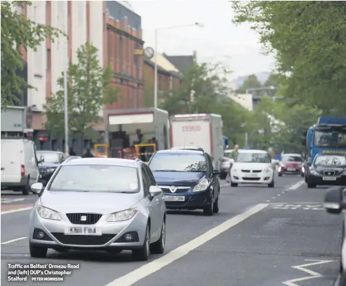  ?? PETER MORRISON ?? Traffic on Belfast’ Ormeau Road and (left) DUP’S Christophe­r Stalford