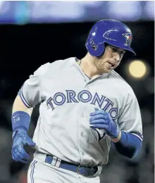  ?? LINDSEY WASSON/GETTY IMAGES FILES ?? Toronto Blue Jays’ slugger Justin Smoak rounds third after hitting a home run in the ninth inning against the Seattle Mariners, at Safeco Field on June 10, 2017, in Seattle.