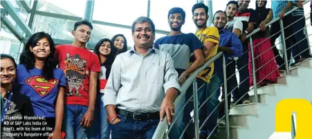  ??  ?? Dilipkumar Khandelwal, MD of SAP Labs India (in front), with his team at the company's Bangalore office