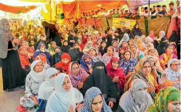  ??  ?? Women during a sit-in protest against the CAA, NRC and the NPR, at Shaheen Bagh in New Delhi on Sunday.