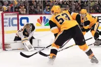  ?? KEITH SRAKOCIC/ASSOCIATED PRESS ?? Boston goaltender Jaroslav Halak makes a save as Pittsburgh’s Teddy Blueger (53) and Brandon Tanev look for a rebound. The Penguins edged the Bruins, 4-3.