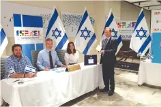  ?? (Ronen Kedem) ?? JEWISH AGENCY Chairman Isaac Herzog votes in Toronto.