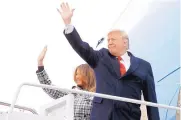  ?? JACQUELYN MARTIN/ASSOCIATED PRESS ?? President Donald Trump and first lady Melania Trump board Air Force One at Andrews Air Force Base, Md.