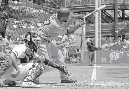  ?? AP Photo/Gene J. Puskar ?? ■ Los Angeles Dodgers' Matt Kemp (27) drives in a run from third with a fielder's choice off Pittsburgh Pirates starting pitcher Jameson Taillon in the fifth inning of a baseball game Thursday in Pittsburgh. The Dodgers won, 8-7.