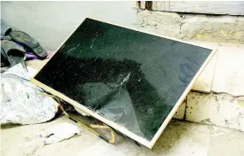  ?? NICHOLAS NUNES PHOTOS ?? This flat screen television is among the items that fleeing Trench Town residents say were destroyed by vandals.