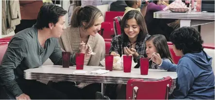  ??  ?? Mark Wahlberg, left, Rose Byrne, Isabela Moner, Julianna Gamiz and Gustavo Quiroz form an Instant Family.