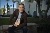  ?? PHOTO BY JEFF GRITCHEN, ORANGE COUNTY REGISTER/SCNG ?? Author and teacher Ernesto Cisneros at Santa Ana High School in Santa Ana, CA, on Tuesday, January 26, 2021. Cisneros, a Santa Ana teacher who wrote a children’s book depicting an immigrant family facing the prospect of deportatio­n.