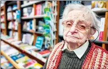  ??  ?? Bookshop owner Helga Weyhe poses in her shop in the German town of
Salzewedel on Jan 10, 2018. (AFP)