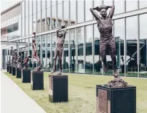  ??  ?? 1
Charles Barkley with his 63-inch bronze sculpture by Chad Fisher.
2
The 76ers Legends Walk.