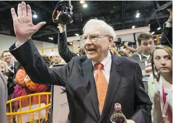  ?? NATI HARNIK / THE ASSOCIATED PRESS FILES ?? Investor Warren Buffett helped persuade scores of the super-rich to sign a giving pledge committing them to donating at least half their wealth.