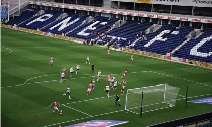  ?? Photograph: Dave Thompson/PA ?? Preston host Stoke at an empty Deepdale last month. Championsh­ip clubs say their biggest concern is the current financial ‘cliff edge’ below the Premier League.